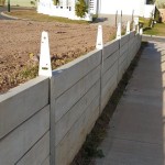 Retaining Wall With Fence On Top Cost